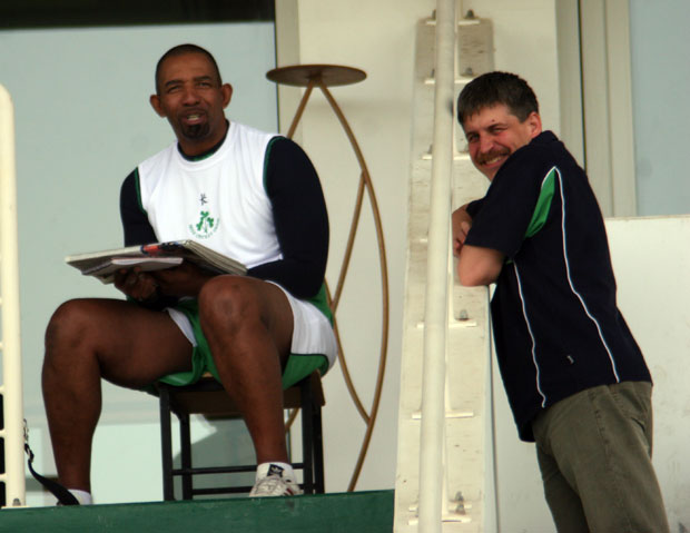 Ian Callender has a word with Phil Simmons