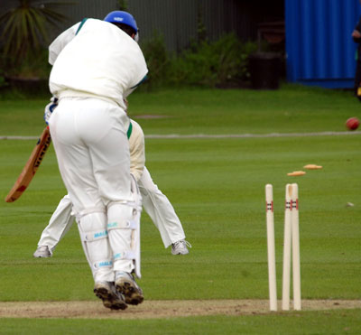 Paul Mooney's 100th wicket for Ireland breaks the stump (©CricketEurope)