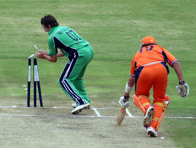 Daan Van Bunge is run out by McCallan (©CricketEurope)