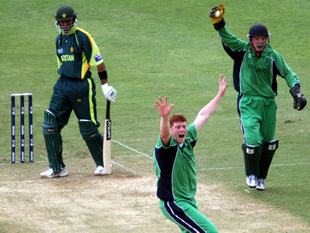 Kevin and Niall O'Brien combine to take a wicket (©CricketEurope)
