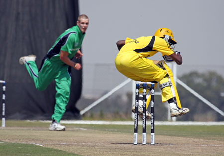Boyd Rankin knocks Junior Kwebiha over (©CricketEurope)