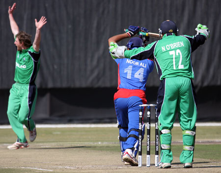 John Mooney traps Noor Ali lbw (©CricketEurope)