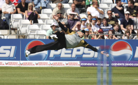 Leaping effort by Brendon McCullum (©Rob O'Connor/CricketEurope)