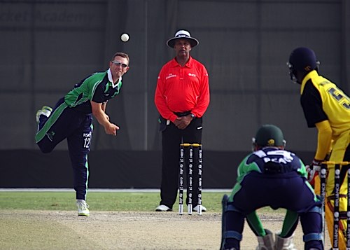Andrew White bowling for Ireland (©CricketEurope)