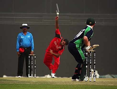 Farhan Khan bowling for Oman (©CricketEurope)