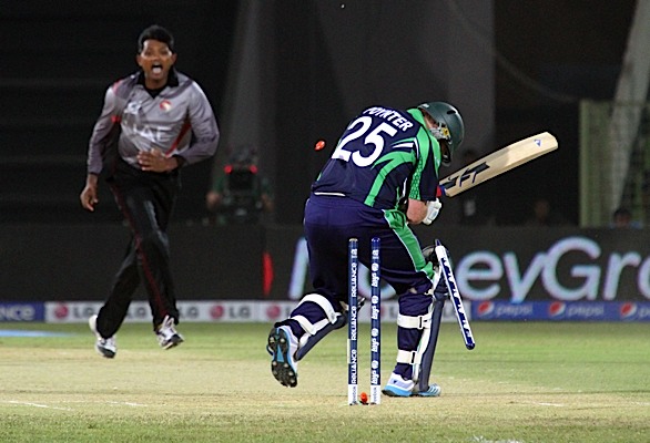 Andrew Poynter's stump goes cartwheeling (©CricketEurope)