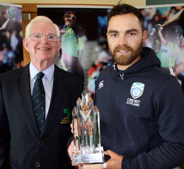 Cricket Ireland President Dr Murray Power presents Series trophy to Scotland captain Preston Mommsen (©CricketEurope)