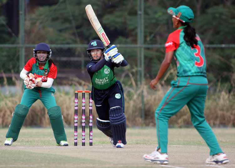 Ireland's Cecelia Joyce drives in the final against Bangladesh