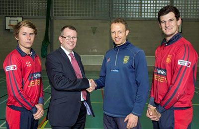 Tim Brown, CEO of Jersey Post,  with Neil MacRae, Luke Gallichan and Anthony Hawkins-Kay