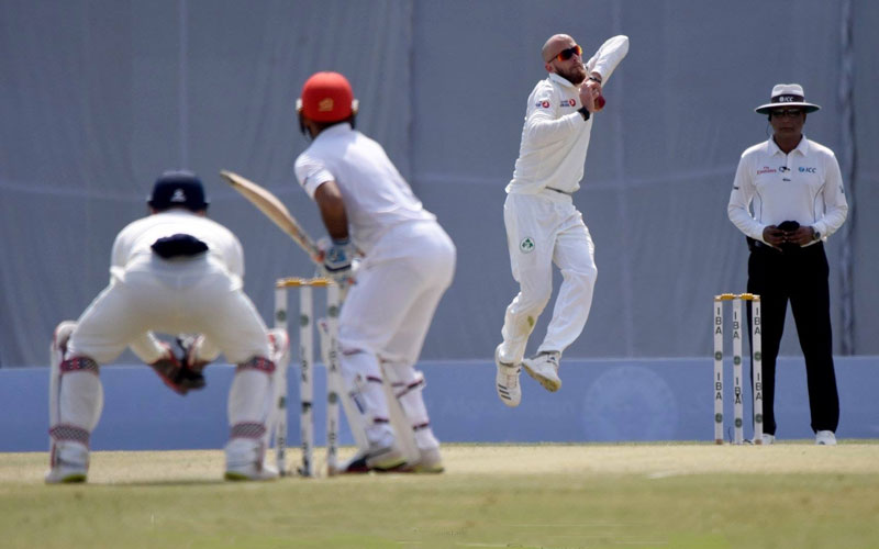 Day 2: James Cameron-Dow bowling (©ACB/Cricket Ireland)