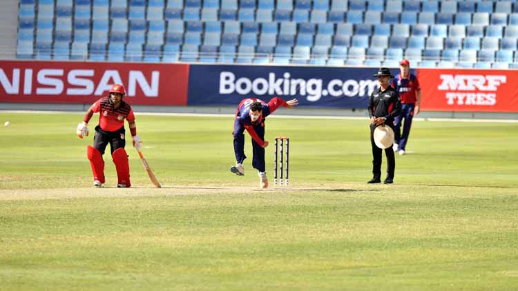 Tony Hawkins-Kay bowling for Jersey against Singapore
