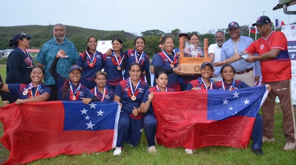 Samoa squad with the trophy