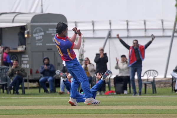 Sompal Kami celebrates a wicket