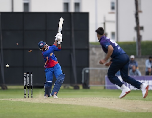 The winning moment as Safyaan Sharif bowls Lalit Rajbanshi