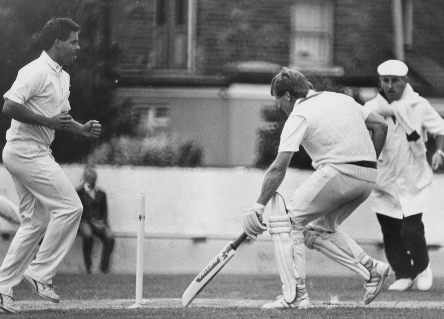 Stephen Warke makes his ground under the watchful eye of umpire Sean Moore (©Eddie Kelly)