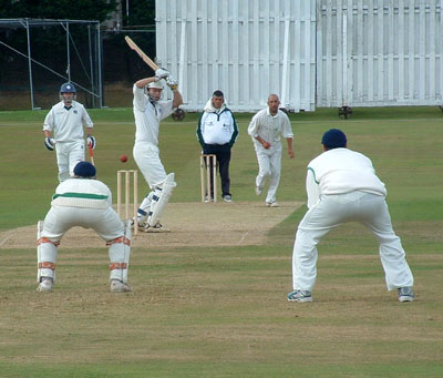 Neil MacRae watches the ball into Gary Wilson's gloves (©CricketEurope)