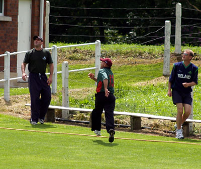 Jeremy Bray and Adrian Birrell take cover as a Peter Gillespie six sails over the line (©CricketEurope)